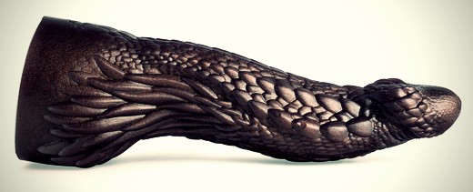 A promotional image showcasing a dragon dildo from Mr. Hankey's