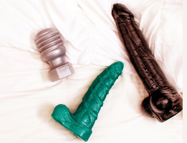 An image showcasing 3 Mr. Hankey's dildos